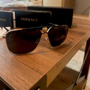 Versace sunglasses, never worn, brand new, and perfect condition